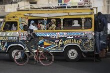 Bus "Transport en commun" & passengers, bicycle