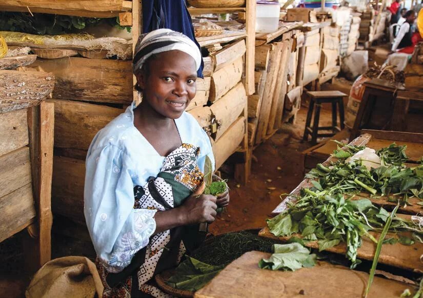 A woman in a market in Taita Taveta County by Peter Steward